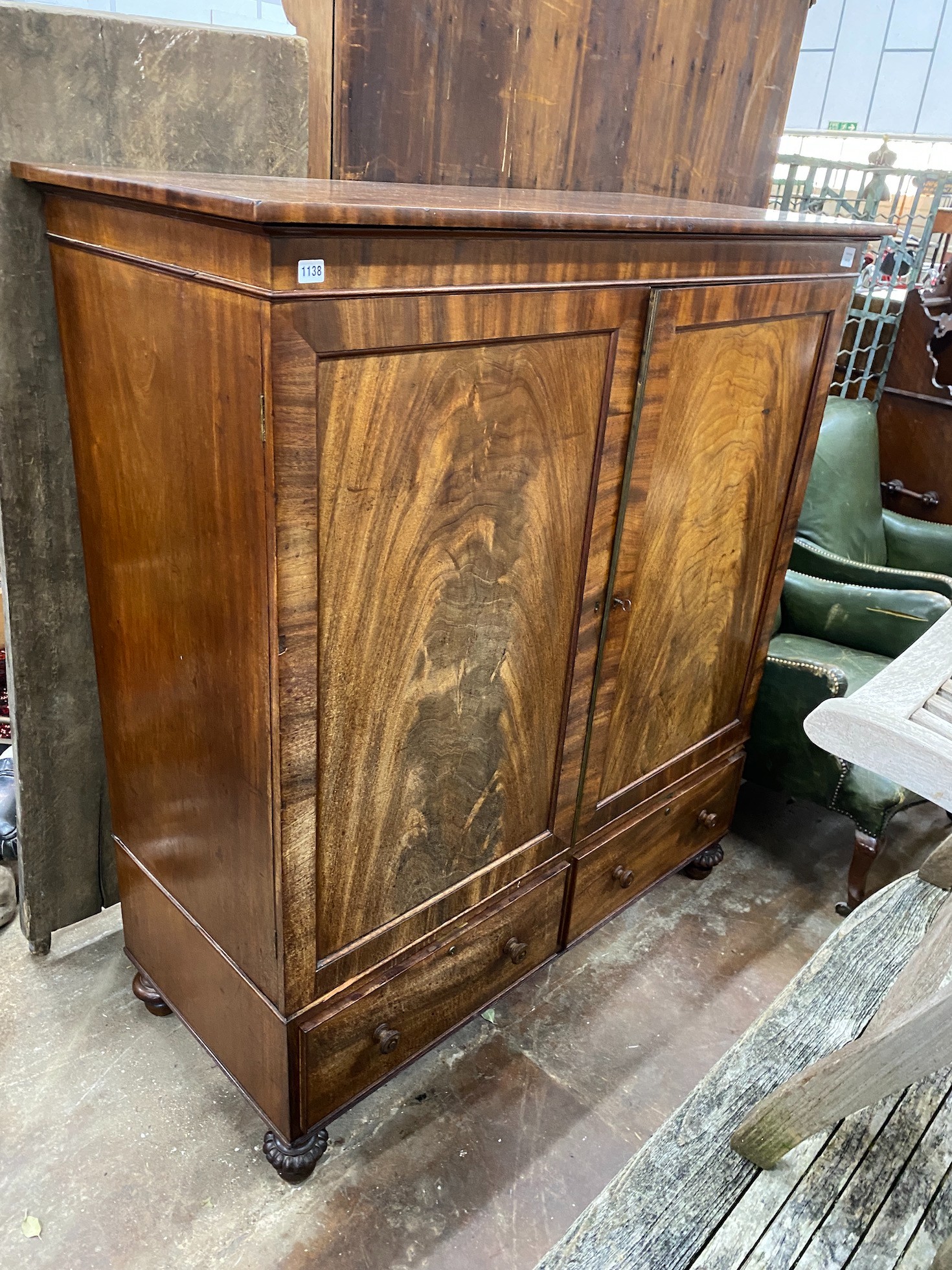 A George III mahogany linen press, width 135cm, depth 60cm, height 152cm